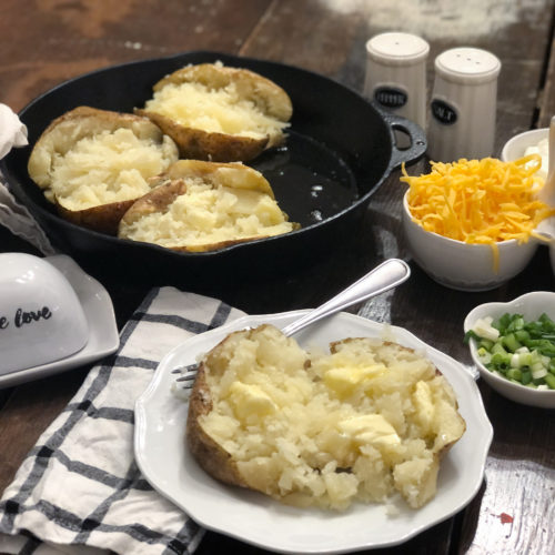 Gold Potatoes With Bacon in a Cast Iron Skillet 